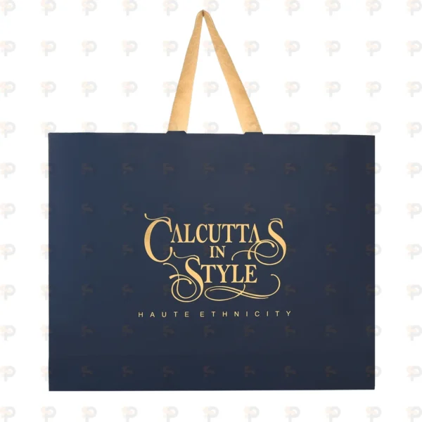 Calcutta in Style Black Laminated Non-Woven XL Bag with Gold Print